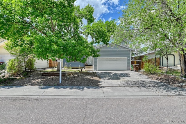 972 Columbine Ave, Colorado Springs, CO 80904 - view of front of property featuring driveway and an attached garage