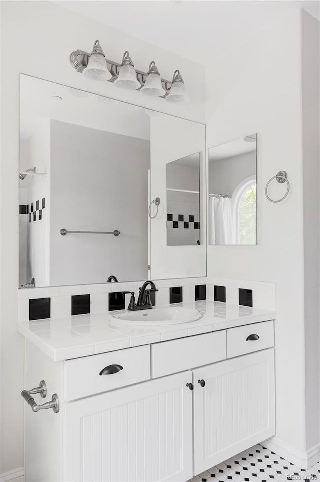 8739 E 23rd Ave, Denver, CO 80238 - bathroom with vanity and a shower with shower curtain