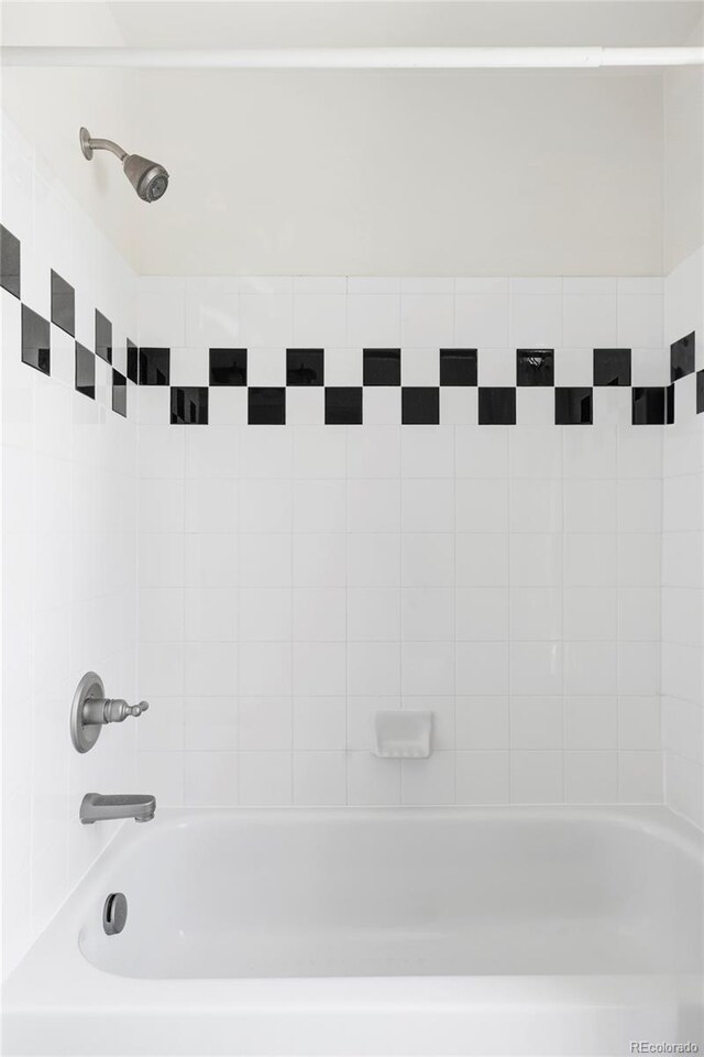 8739 E 23rd Ave, Denver, CO 80238 - bathroom featuring bathing tub / shower combination
