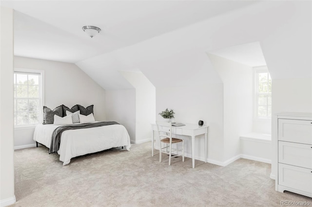 8739 E 23rd Ave, Denver, CO 80238 - bedroom featuring vaulted ceiling and carpet flooring