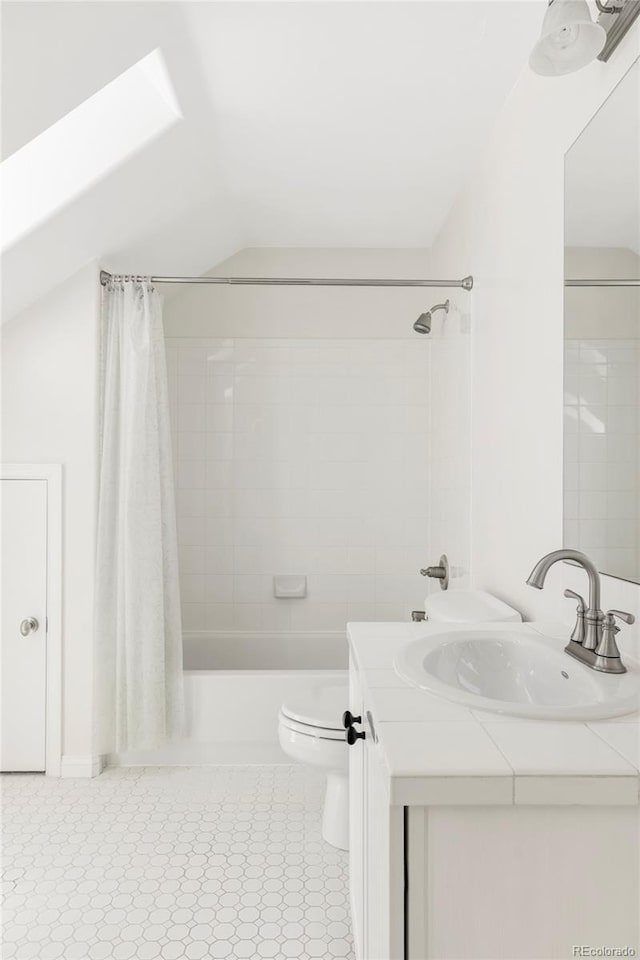 8739 E 23rd Ave, Denver, CO 80238 - bathroom with shower / bath combo, vanity, tile patterned floors, and lofted ceiling
