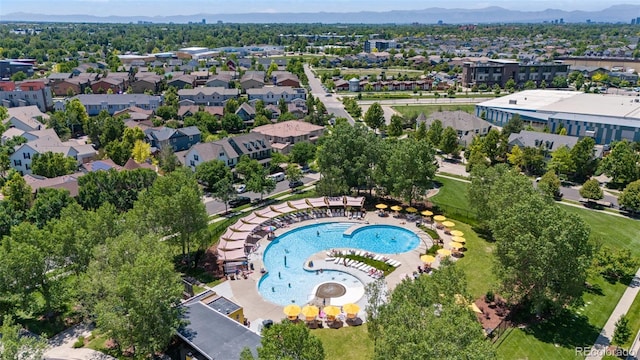 8739 E 23rd Ave, Denver, CO 80238 - drone / aerial view of a pool area and a mountain backdrop