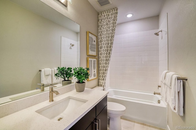 full bath featuring toilet, tub / shower combination, tile patterned flooring, and vanity
