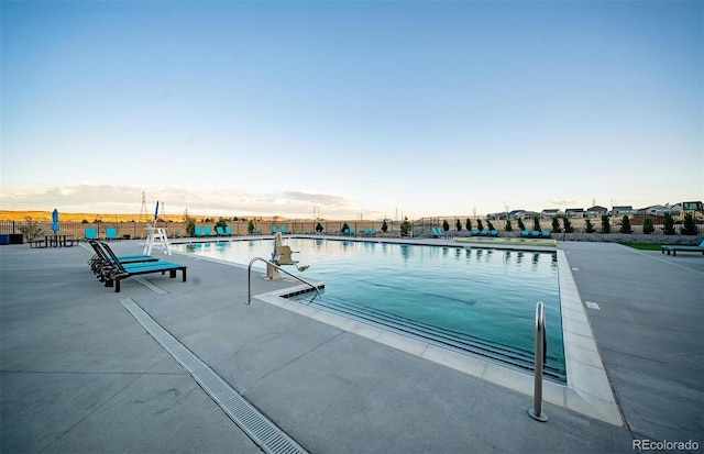 community pool with a patio
