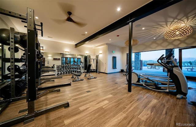 gym featuring a ceiling fan, wood finished floors, baseboards, and recessed lighting