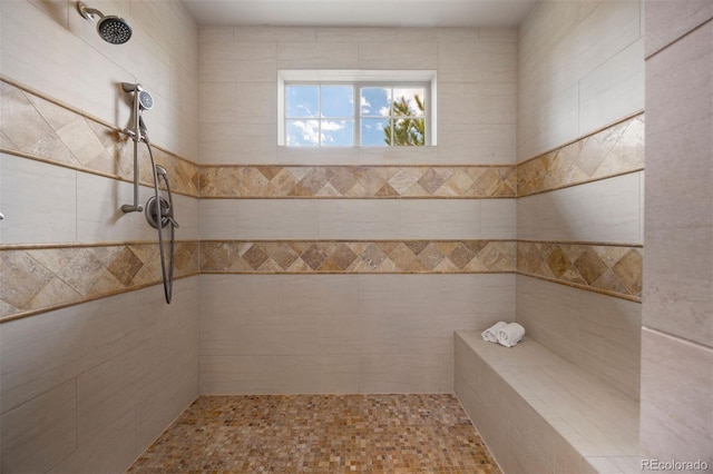 full bath featuring tiled shower