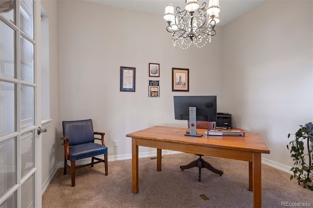 office space featuring carpet floors, baseboards, and a chandelier