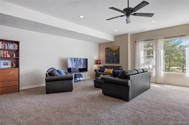 living room with baseboards, ceiling fan, carpet, and recessed lighting