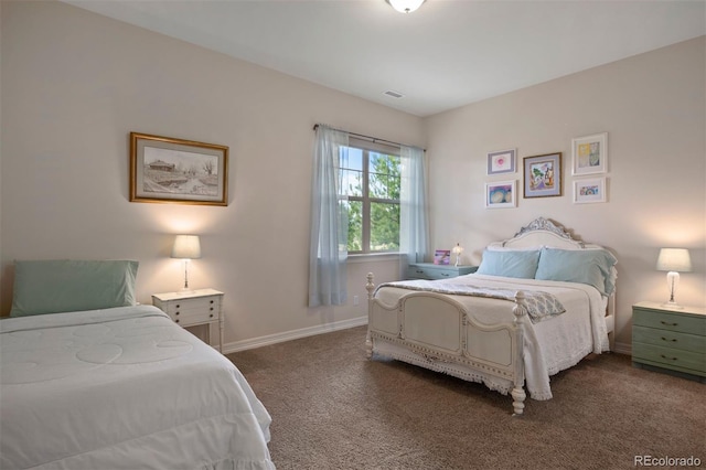 bedroom featuring carpet flooring, baseboards, and visible vents