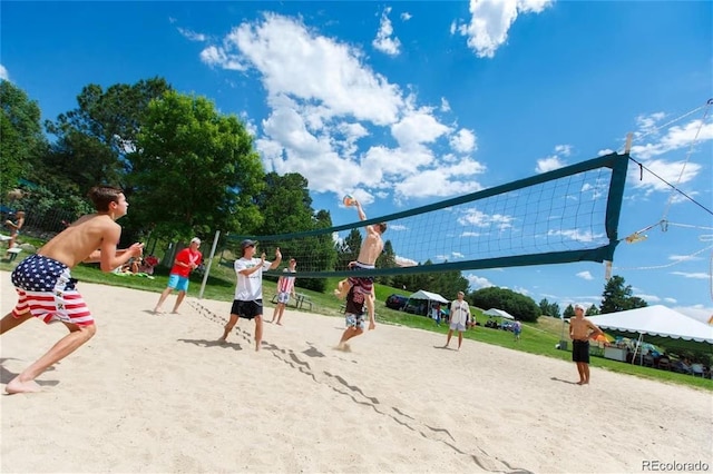 view of property's community featuring volleyball court