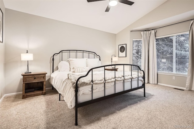 16179 W 70th Pl, Arvada, CO 80007 - carpeted bedroom featuring vaulted ceiling, baseboards, and a ceiling fan