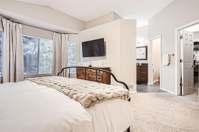 16179 W 70th Pl, Arvada, CO 80007 - carpeted bedroom featuring baseboards and vaulted ceiling