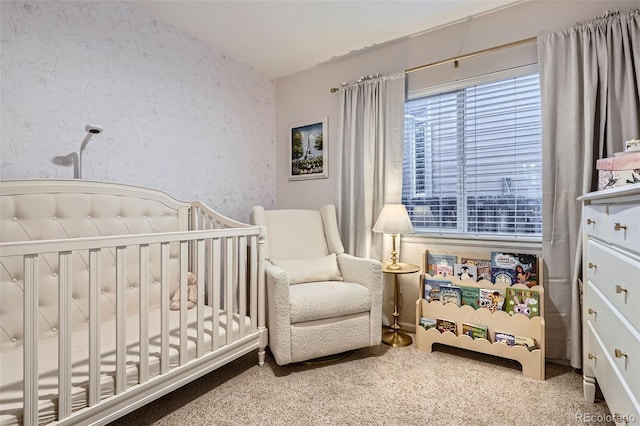 16179 W 70th Pl, Arvada, CO 80007 - carpeted bedroom featuring wallpapered walls and a crib
