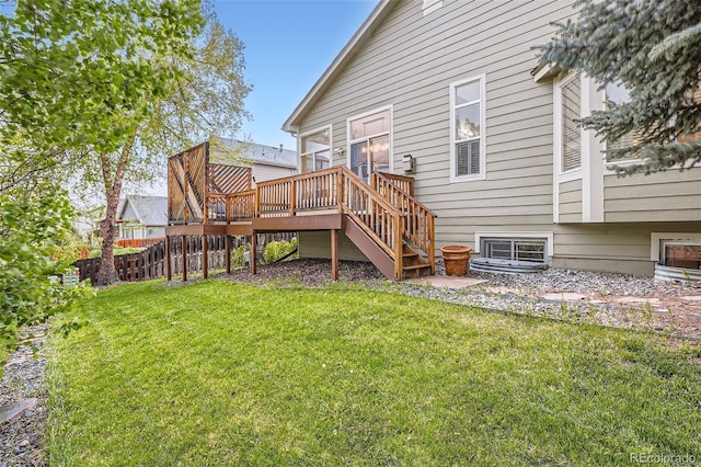 16179 W 70th Pl, Arvada, CO 80007 - back of property with a wooden deck and stairway