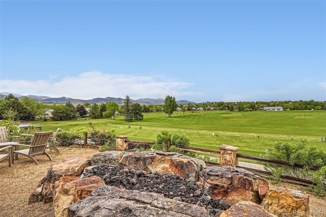 16179 W 70th Pl, Arvada, CO 80007 - view of yard featuring a mountain view, golf course view, and fence