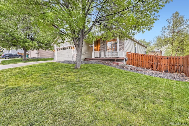 16179 W 70th Pl, Arvada, CO 80007 - view of front of house with covered porch, asphalt driveway, a garage, and stone siding