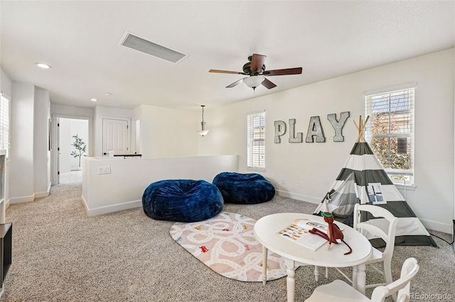 1063 Roslyn Ct, Denver, CO 80230 - sitting room with baseboards, ceiling fan, light carpet, and recessed lighting