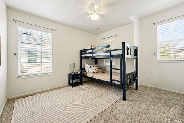 1063 Roslyn Ct, Denver, CO 80230 - bedroom featuring carpet floors, baseboards, and ceiling fan