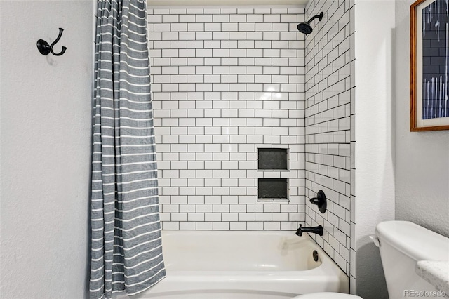 1063 Roslyn Ct, Denver, CO 80230 - bathroom with toilet and shower / bath combo with shower curtain