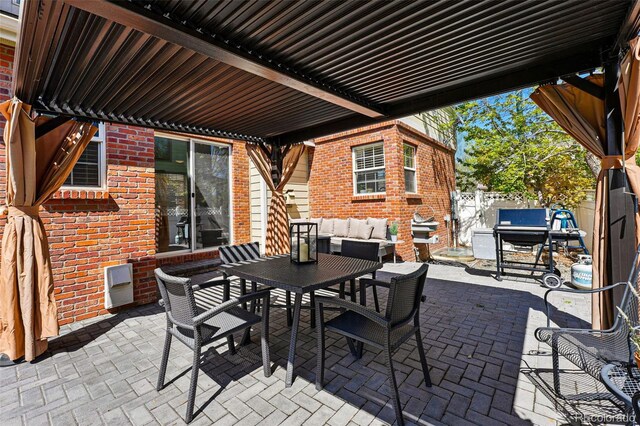 1063 Roslyn Ct, Denver, CO 80230 - view of patio featuring fence and outdoor dining area