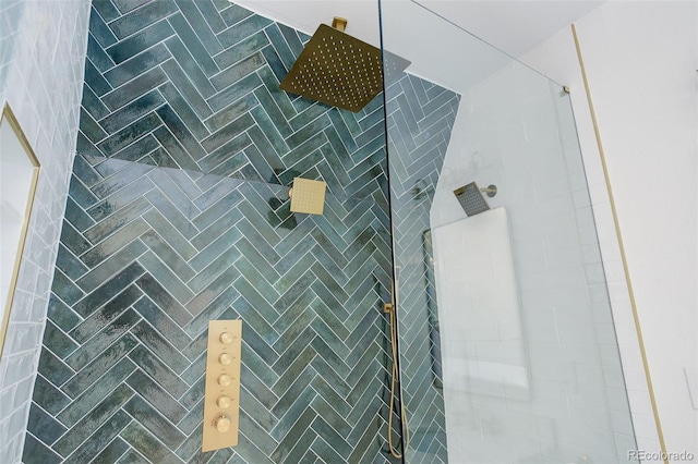 bathroom view of tiled shower
