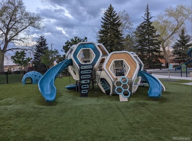 view of play area featuring a lawn