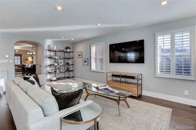 living room featuring dark hardwood / wood-style floors