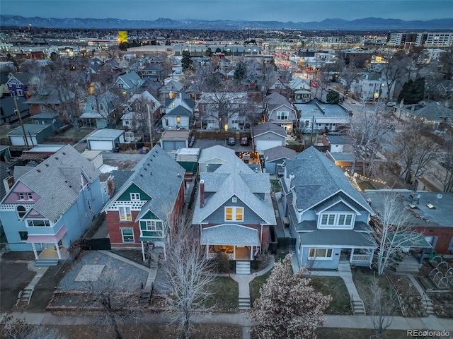 drone / aerial view featuring a mountain view