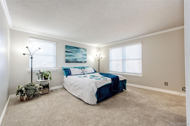 bedroom featuring carpet flooring, ornamental molding, and a textured ceiling