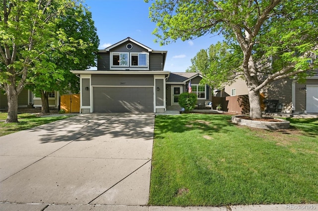 traditional home with a garage and driveway