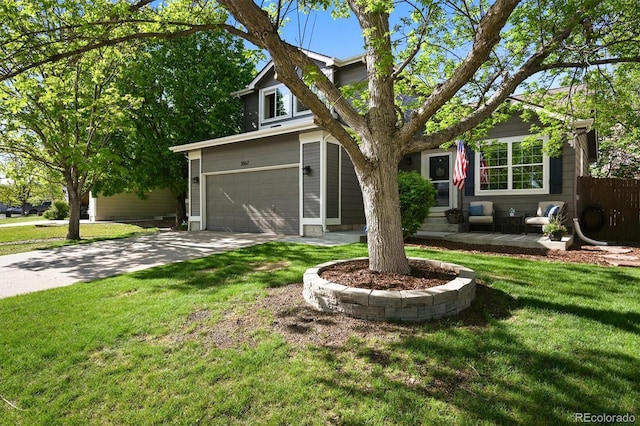 view of front of home featuring an attached garage and driveway