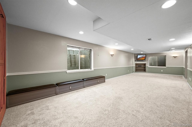 spare room with recessed lighting, carpet flooring, and baseboards