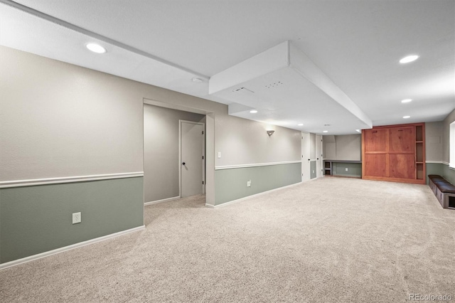finished basement featuring carpet floors, recessed lighting, and baseboards