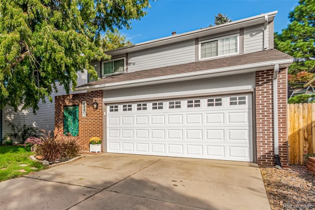 front facade with a garage