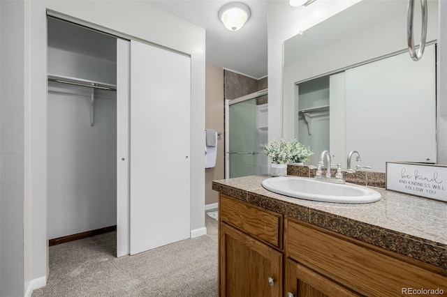 bathroom featuring vanity and walk in shower