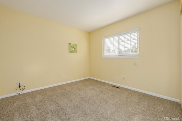 empty room featuring carpet