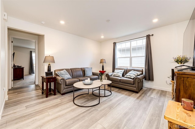 living room with light hardwood / wood-style floors