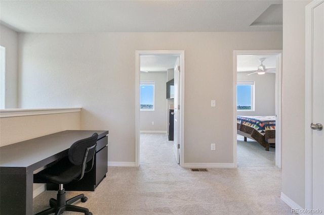 7407 Rufous Fronted Vw, Colorado Springs, CO 80923 - carpeted home office featuring baseboards