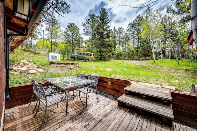 12346 Bear Haven Rd, Conifer, CO 80433 - wooden terrace featuring outdoor dining space
