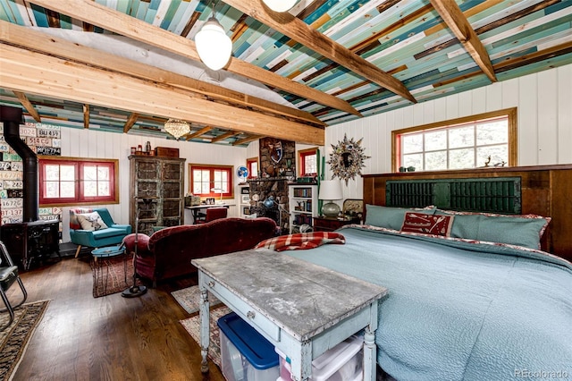 12346 Bear Haven Rd, Conifer, CO 80433 - living area with a wood stove and wood finished floors