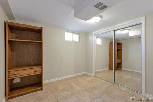 interior space with a closet