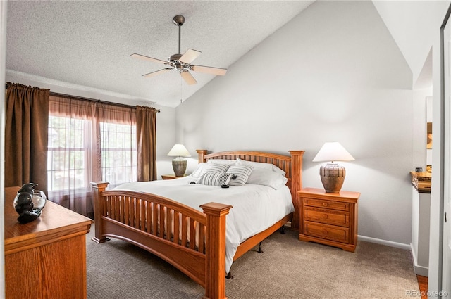 943 S Fairplay St, Aurora, CO 80012 - carpeted bedroom with vaulted ceiling, a textured ceiling, a ceiling fan, and baseboards