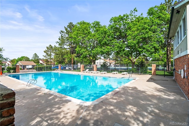 943 S Fairplay St, Aurora, CO 80012 - community pool with a patio area