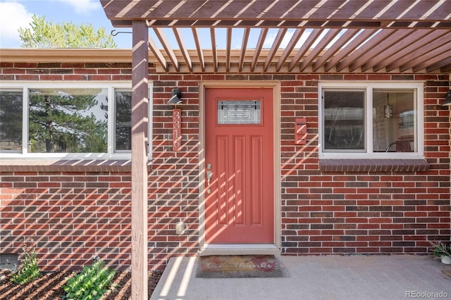 3316 N Glencoe St, Denver, CO 80207 - view of exterior entry featuring brick siding