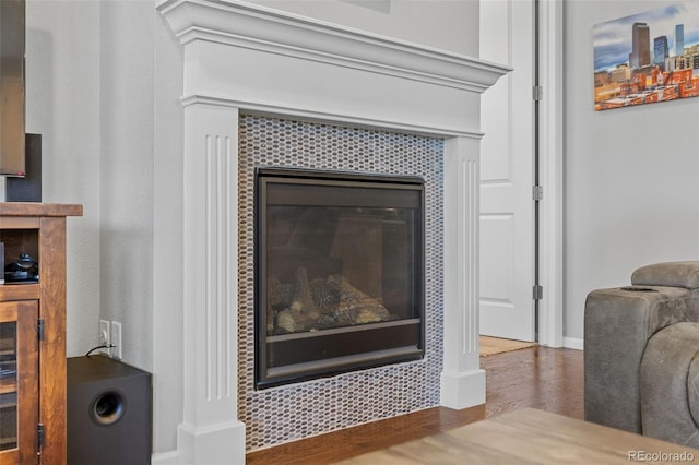 15895 Columbine St, Thornton, CO 80602 - detailed view of wood finished floors and a fireplace