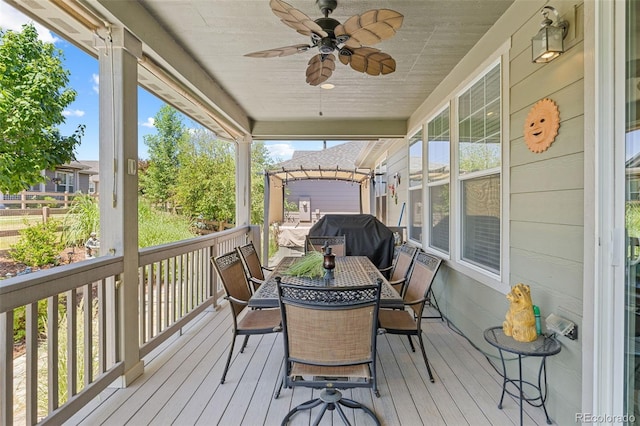 15895 Columbine St, Thornton, CO 80602 - wooden terrace featuring grilling area, a ceiling fan, and outdoor dining area