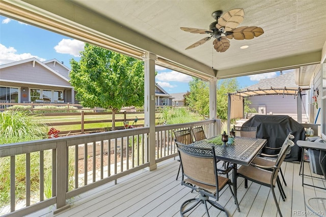 15895 Columbine St, Thornton, CO 80602 - deck featuring ceiling fan, area for grilling, and outdoor dining space