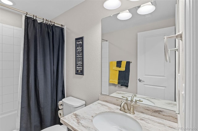 15895 Columbine St, Thornton, CO 80602 - full bathroom with vanity, a textured wall, and shower / bath combo