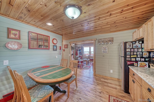 10199 W Cheyenne Cir, Salida, CO 81201 - dining room featuring wooden ceiling, light wood-style floors, wood walls, and recessed lighting