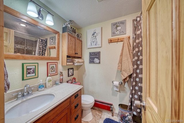 10199 W Cheyenne Cir, Salida, CO 81201 - full bath with toilet, vanity, a textured ceiling, curtained shower, and a textured wall